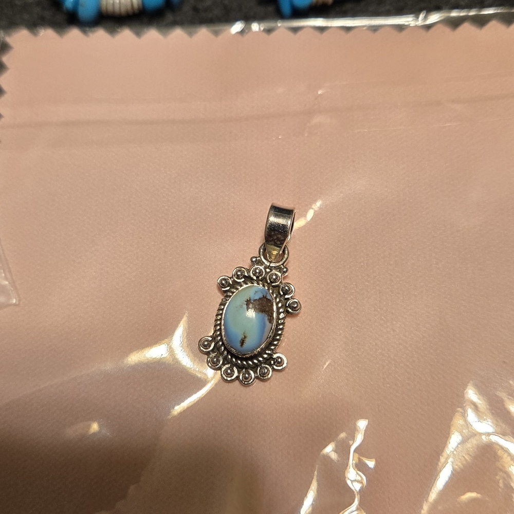 Elegant Silver and Blue Pendant